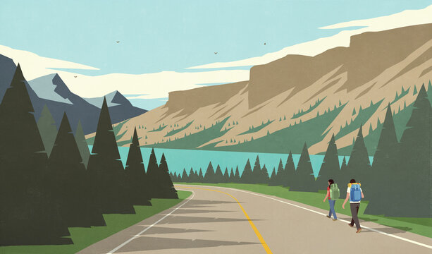 Couple backpacking on remote summer mountain road