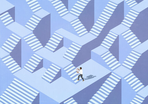 Man with map navigating maze of stairs