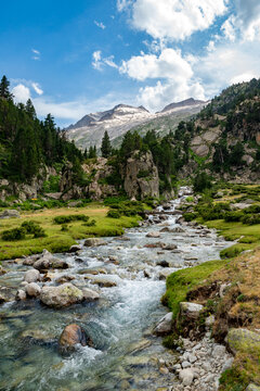 River and Aneto massif view from Plan d'Aigualluts, Posets-Maladeta Natural Park, Huesca, Aragon, Spain