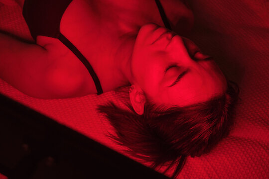 Woman getting red light therapy for skin wellness