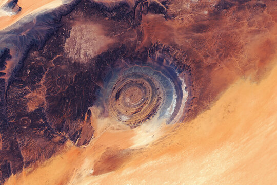 stunning Richat Structure, Eye of the Sahara. magnificent circular geological formation and dramatic landmark in the desert. Elements of this image furnished by NASA