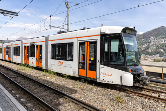 Commuter train type Stadler Rail Tramlink on Lugano Ponte Tresa Railway line in Lugano, Switzerland
