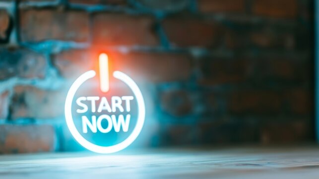 Start now glowing neon power button concept on dark brick wall, beginning new opportunities, activation