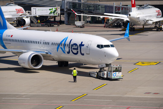 Ajet passenger airplane Boeing 737 MAX 8 registration TC-OHR pushback at Swiss Z&uuml;rich Airport on a sunny spring day. Photo taken May 26th, 2026, Zurich Airport, Switzerland.