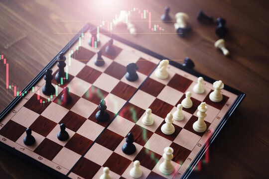 Black and White chess with player, Businessman and Businesswoman shaking hands after end game of thinking strategy to moving chess figure in competition with opposite player and planning.