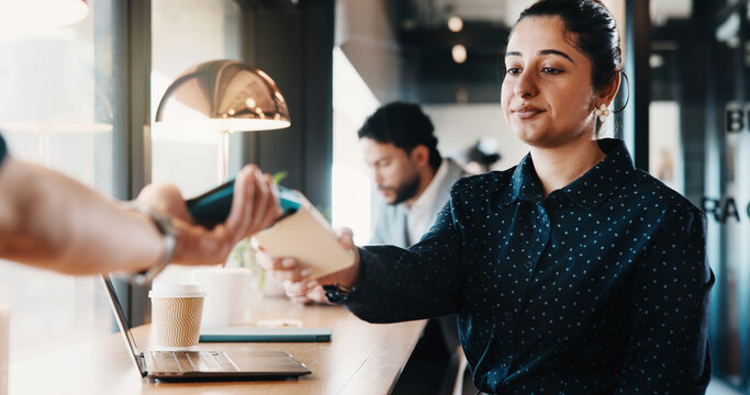 Laptop, woman and phone with pos machine in coffee shop for payment or wireless transaction. Female person, waiter or customer with smartphone tap for mobile banking, checkout or service in cafe