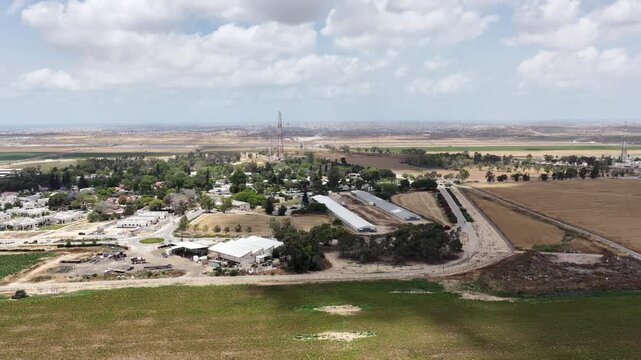 Aerial View Of Nir Oz Near Gaza Border Israel
Drone footage overlooking Nir Oz kibbutz and Shujaiyya Gaza skyline May 26 2026 Israel
