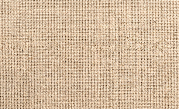 Brown burlap texture background with detailed woven jute sackcloth fiber pattern for clean rustic wallpaper and mockup