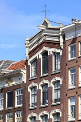 Fototapeta premium Herengracht Canal Building Facade with Sculpted Decoration in Amsterdam, Netherlands