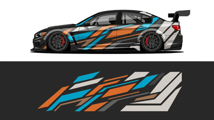Fototapeta premium Vibrant racing car side view with blue orange graphics on a race track.