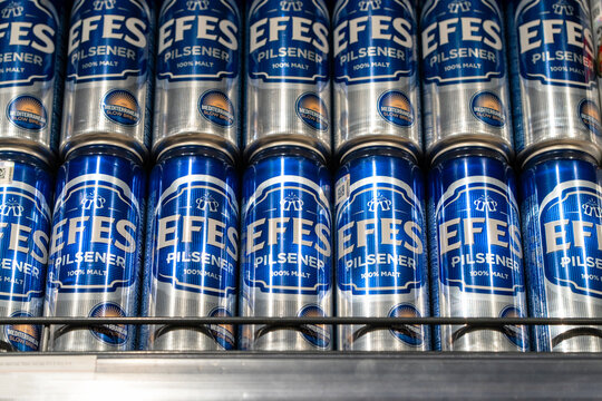 Cans of Efes Pilsener beer on supermarket shelf. Minsk, Belarus - March 30, 2026