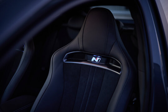 A close view of a Hyundai i30 N seat with racing design and N logo, highlighting the sporty interior style of the car  Katowice, Poland, 19.06.2021