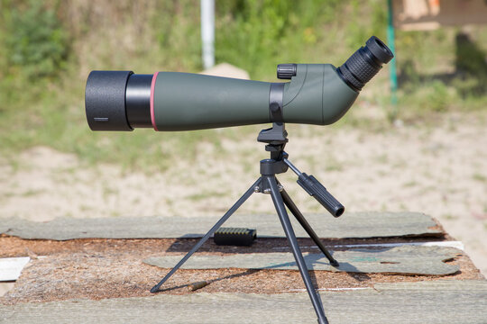 Monocular telescope on a tripod. Selective focus.