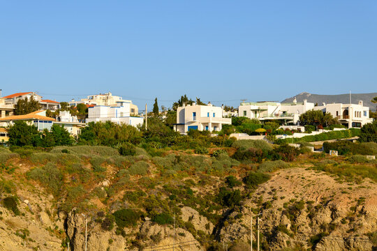 Mountainside houses in the port town of Rafina, Greece