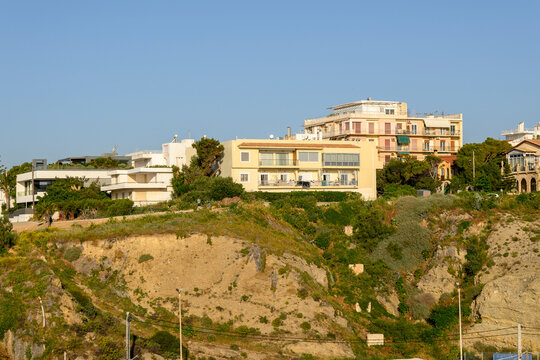 Mountainside houses in the port town of Rafina, Greece