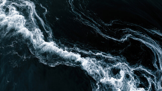 Dark ocean surface with abstract white wave patterns