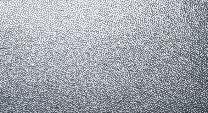 Elegant metallic silver leather texture provides a luxurious and sophisticated background for design