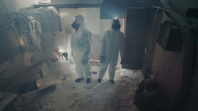 Research crew in protective suits documenting frozen sample recovery inside derelict house with bright headlamp, camera capture and careful vial handling, methodical preservation atmosphere