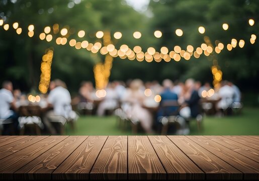 Outdoor dining scene with blurred guests string lights and a wooden table foreground for product placement
