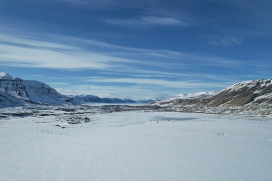 Frozen Arctic Valley and Mountain Landscape in Svalbard Interior Wilderness