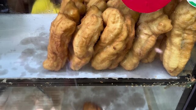 Tasty chinese snack, Cak We, made from chewy salty flour base and deep frying process