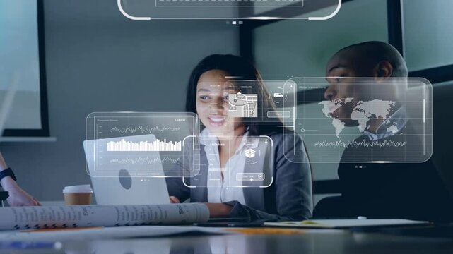 Woman typing on laptop in tech meeting, spawning chart holograms, team bumping fists reviewing data