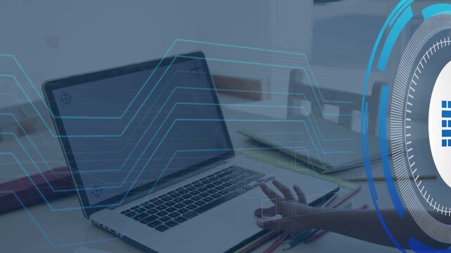 Boy tapping trackpad in home study, activating animated firewall HUD and visualizing data lines