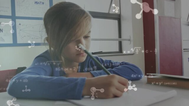 Male student touching pencil to paper, animated math equations appearing over page solving math