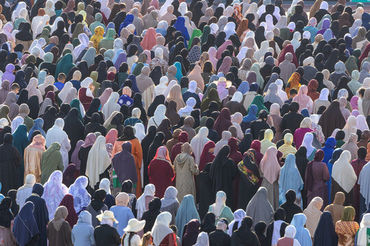 Mulhouse, France - 27 May 2026: View of a large crowd of Muslim women wearing colorful hijabs and traditional clothing gathered at the Stade de l'Ill for a religious celebration.