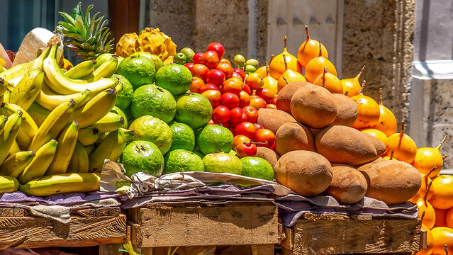 Colombia, Cartagena, exotic fruits are being sold at a roadside stall.