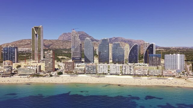 Aerial panorama of Benidorm coastline and urban skyline Spain.