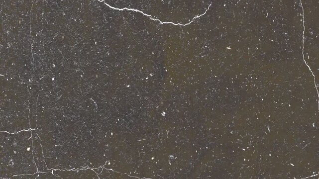 Dark Vintage Film Scratch Texture with Dust Particles and Distressed Grunge Overlay