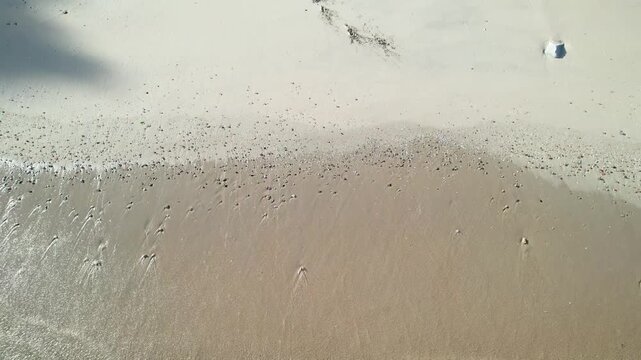 Aerial view of a sandy beach with a boat ramp The Concept of coastal tranquility