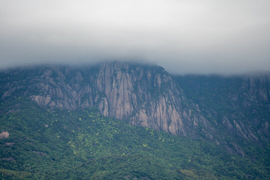 Dense clouds cover the rocky peaks of Lingshan Mountain in Shangrao China