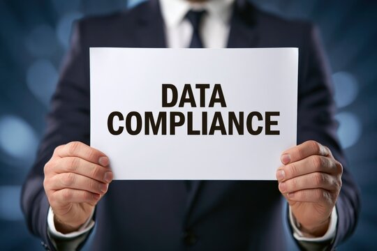 Corporate compliance officer showing data compliance text
