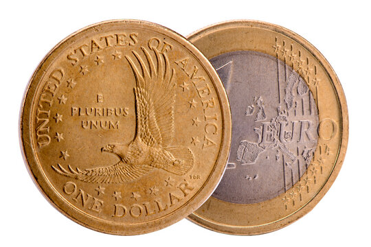 Eine Eurom&uuml;nze und eine Dollarm&uuml;nze liegen &uuml;bereinander