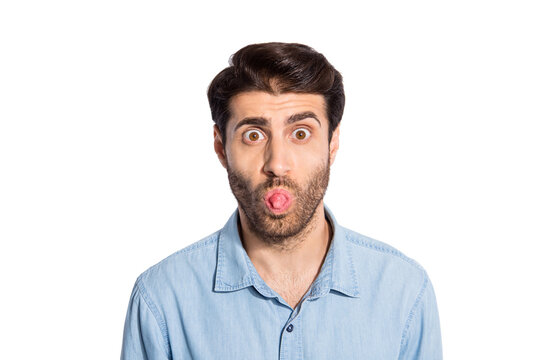 Photo of multiethnic impolite guy sticking tongue out of mouth teasing girlfriend bad mood wear casual denim shirt isolated white color background