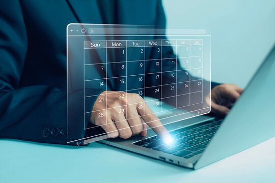 Business professional managing digital calendar on laptop, online scheduling and appointment management concept for business planning, workflow organization, productivity and time management.