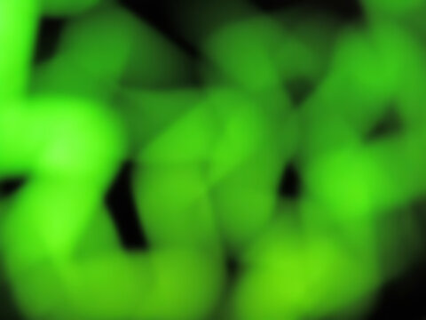 green glowing blurry zig zag neon lines abstract background