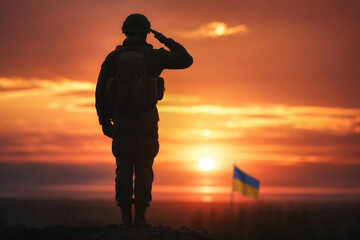Fototapeta premium A Ukrainian Soldier Saluting During a Golden Sunset Representing Resilience, Honor, and National Patriotic Duty