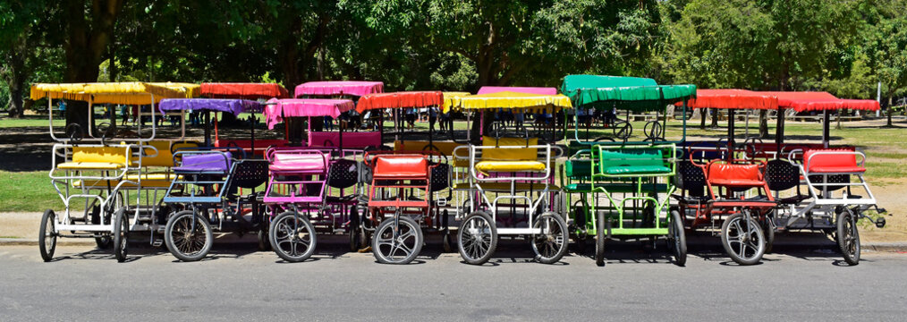 Parked quadricycle bikes on Quinta da Boa Vista, Rio de Janeiro, Brazil 