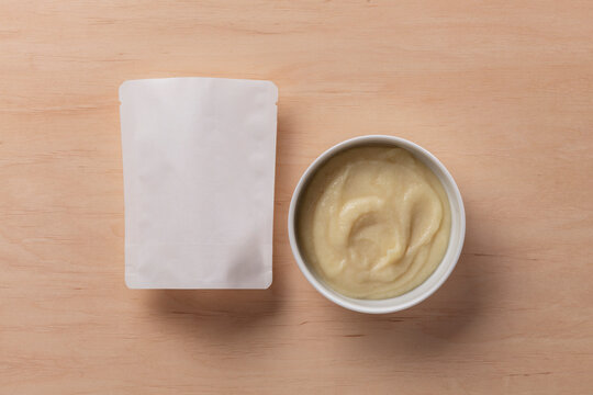 Still life of dummy food packaging for baby food.