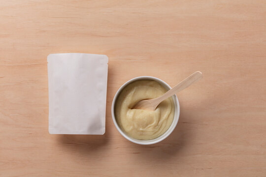 Still life of dummy food packaging for baby food.