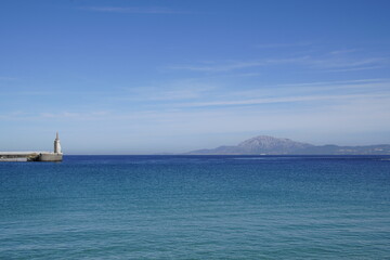 This photograph shows the coastal landscape of Tarifa, Spain, located at the southern tip of Europe. Visible in the image is the Strait of Gibraltar, where the Atlantic Ocean and the Mediterranean Sea © Anatoliy