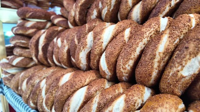 Freshly baked simit for sale at the market in daylight