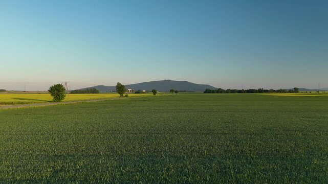 Aerial View of Ślęża Mountain and Rural Landscape in Poland at Sunset