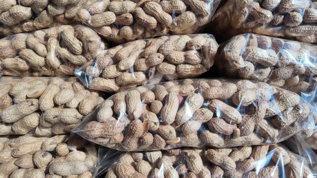 Peanuts packed in bags at a market in the afternoon