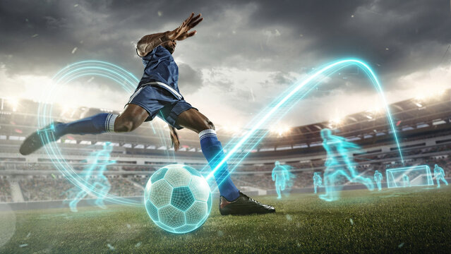 Soccer player kicking digital ball with glowing trajectory analytics in stadium. Concept of sport technology, match analysis, coaching software, broadcast graphics and football performance ads.