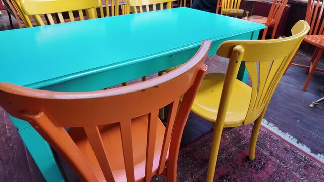 Colorful chairs and table in a cafe