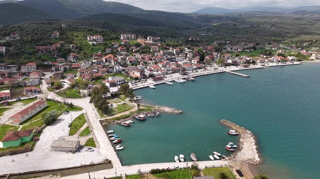 Aerial panorama of Achilleio coastal village and harbor in Greece